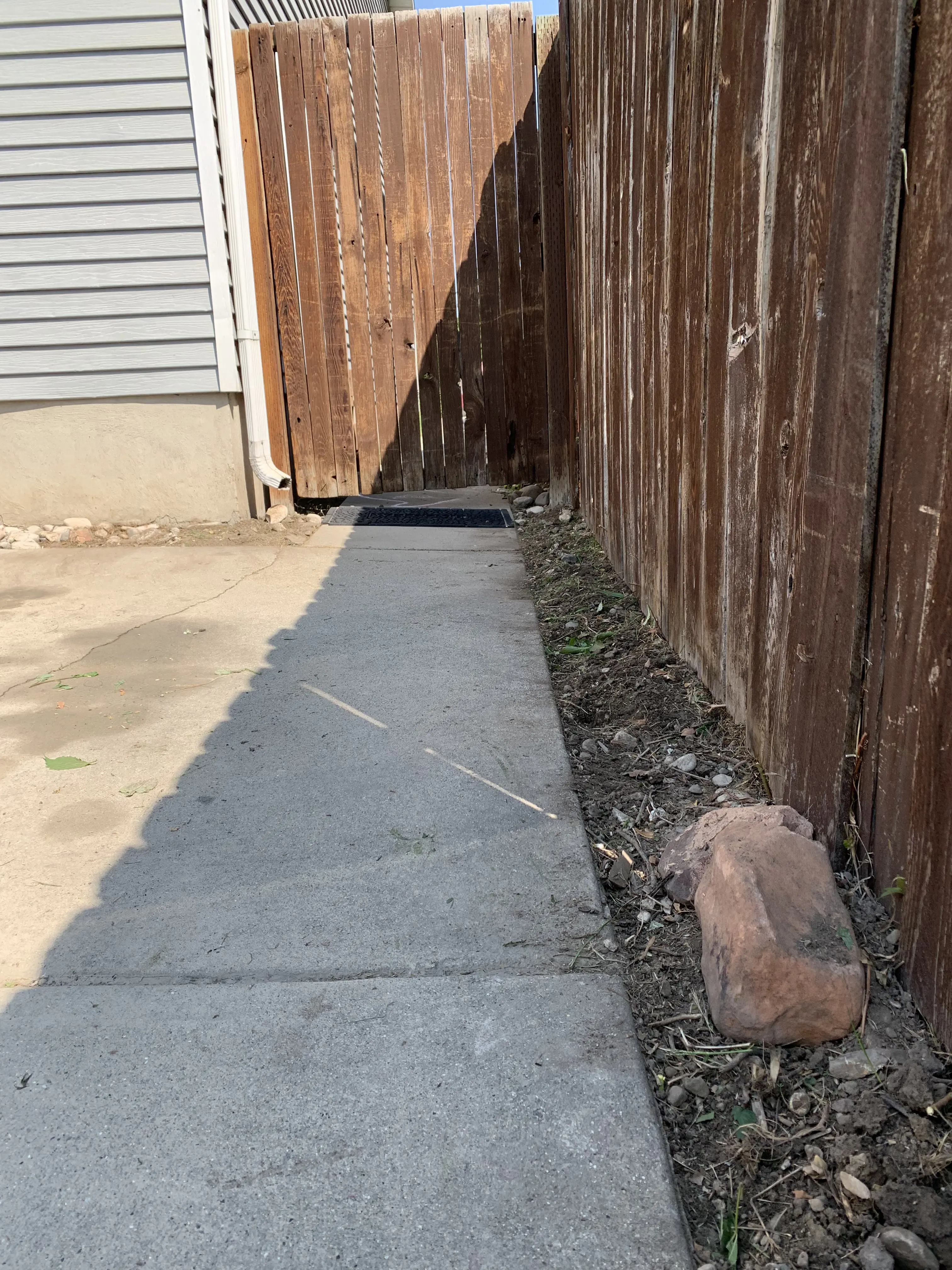 Clean garden bed after ModJobs weed removal in Utah